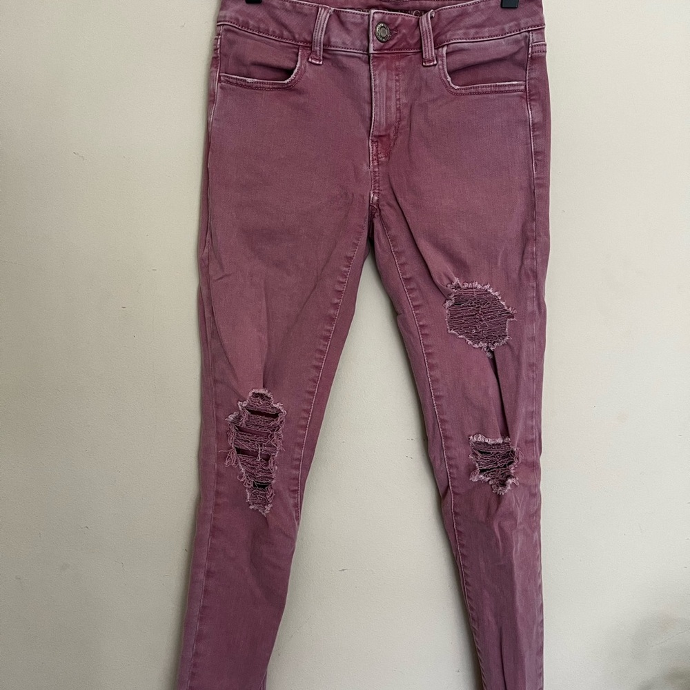 Distressed pink Skinny Jeans